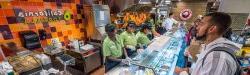 Photo of students placing orders at California Tortilla in the student center dining hall